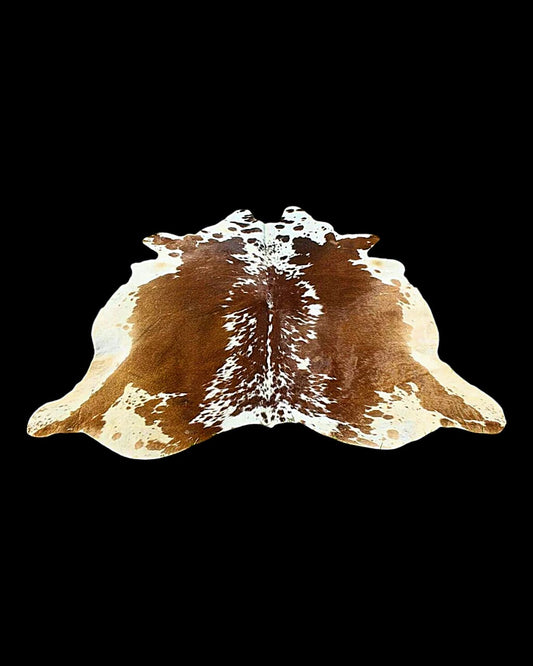 Brown and White Cowhide Rug