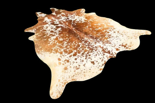 Brown and White Cowhide Rug