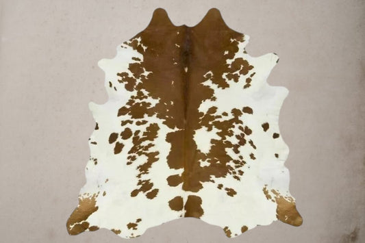 Brown and White Cowhide Rug