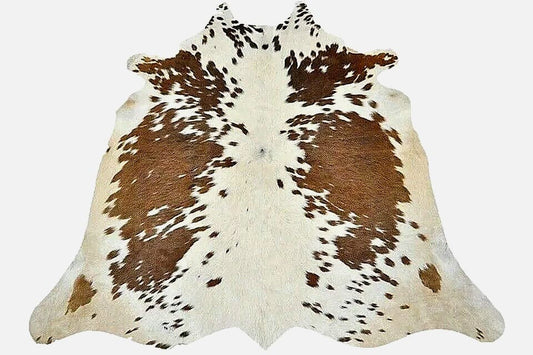 Brown and White Cowhide Rug